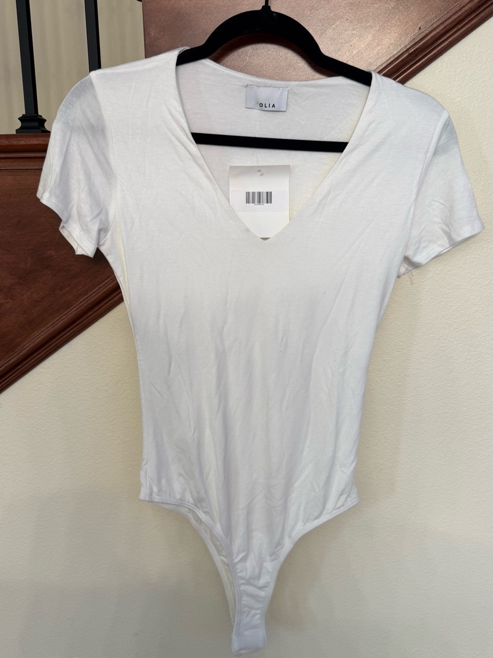 Olia White V-Neck Short Sleeve Bodysuit